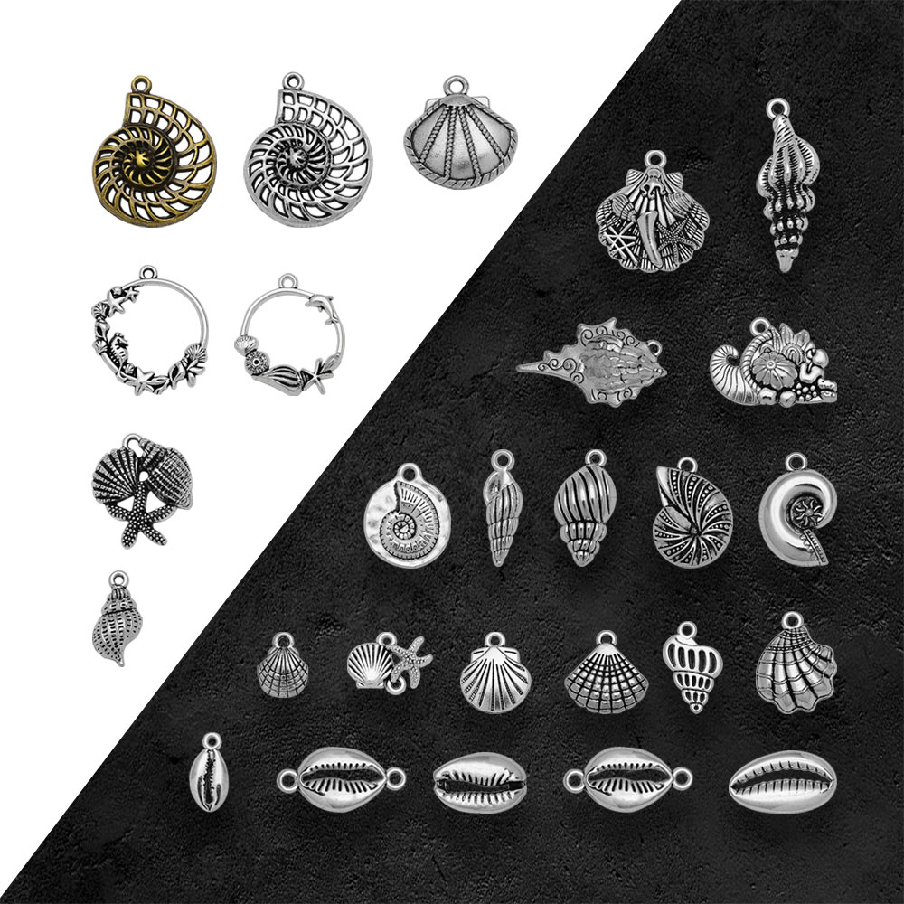 Vintage Fashion Finds - Concha de playa chapada en plata